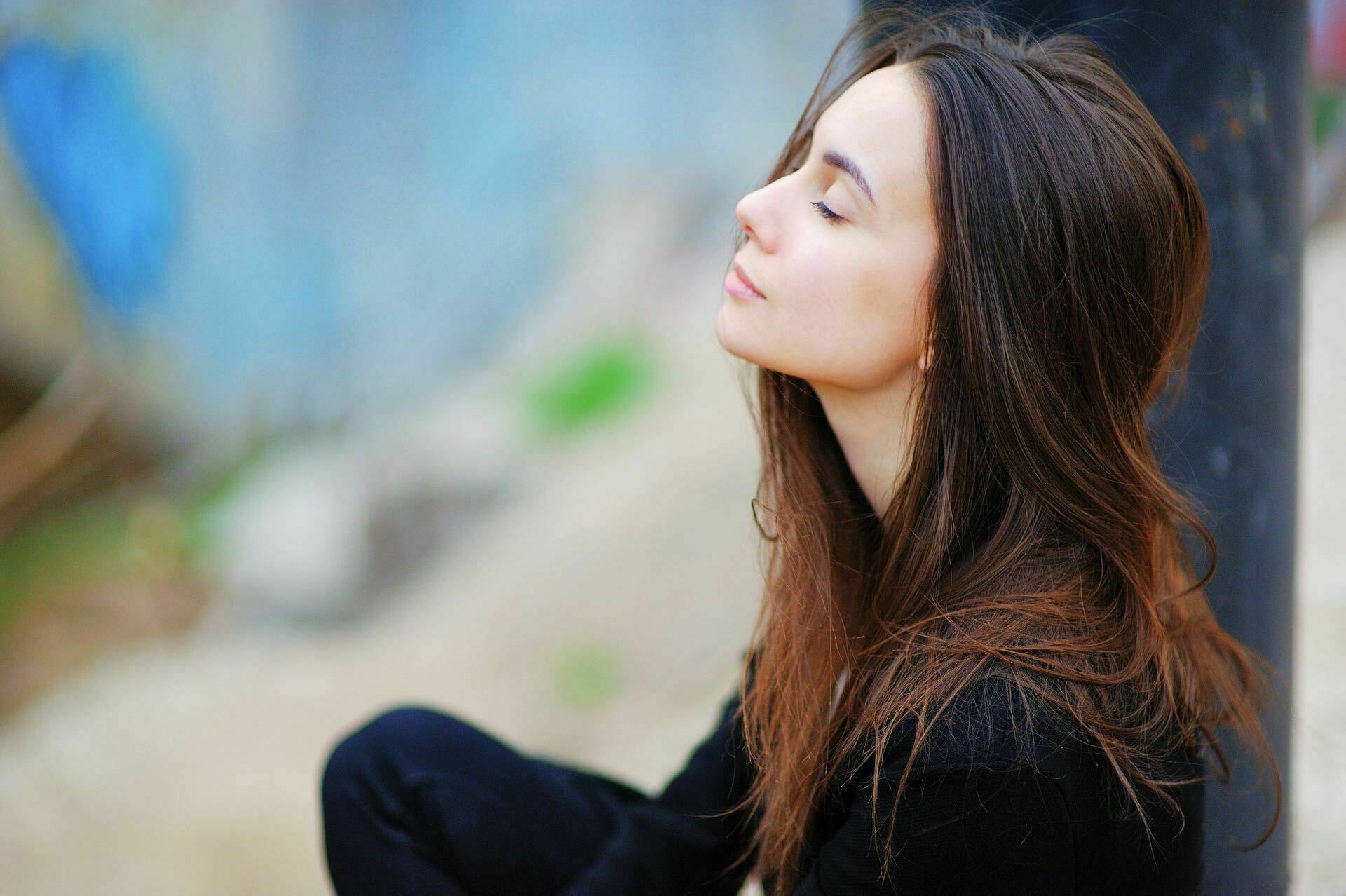 Portrait,Of,A,Dreamy,Cute,Happy,Woman,Worker,Meditating,Outdoors